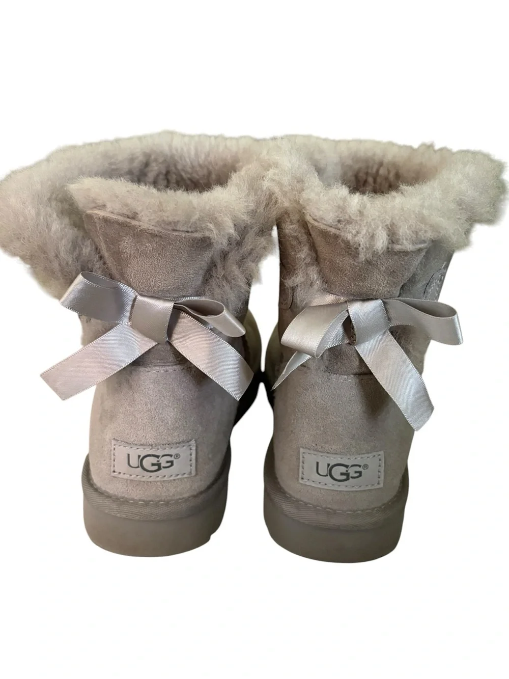 UGG Mini Bailey Light Gray Satin Bow Shearling Boots - 7
